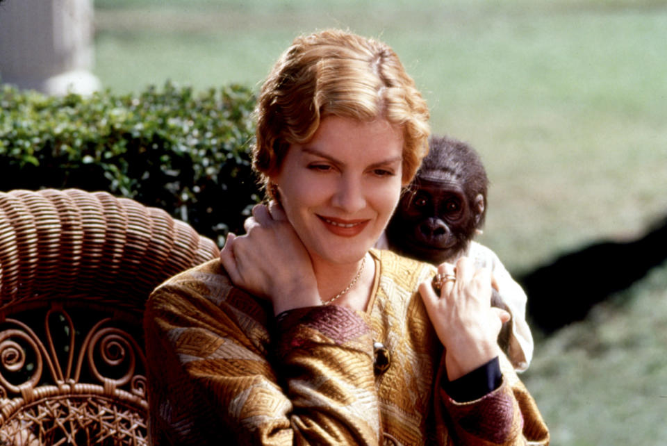 BUDDY, Rene Russo, 1997, monkey on her back - Credit: ©Columbia Pictures/Courtesy Everett Collection