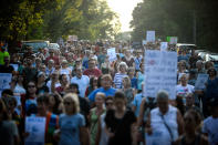 <p>Hundreds march from the site of Justine Damond’s shooting to Beard’s Plaissance Park during a march in honor of Damond Thursday, July 20, 2017, in Minneapolis, Minn. (Photo: Aaron Lavinsky/Star Tribune via AP) </p>