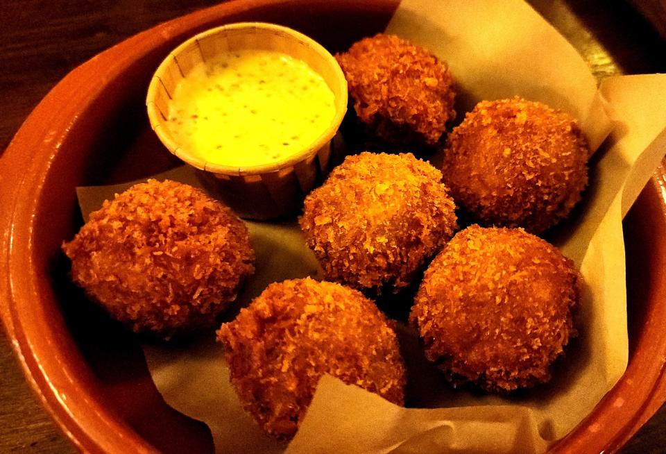 Bitterballen are deep fried, battered balls filled with a beef roux. They are a Dutch treat.