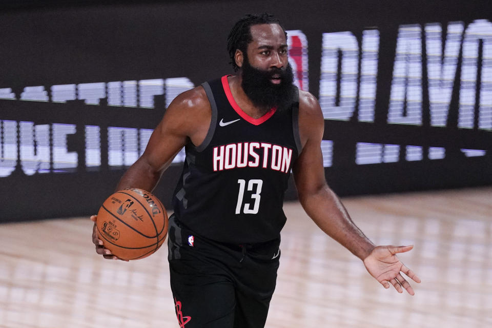 Houston Rockets' James Harden (13) argues a call during the first half of an NBA conference semifinal playoff basketball game against the Los Angeles Lakers Saturday, Sept. 12, 2020, in Lake Buena Vista, Fla. (AP Photo/Mark J. Terrill)