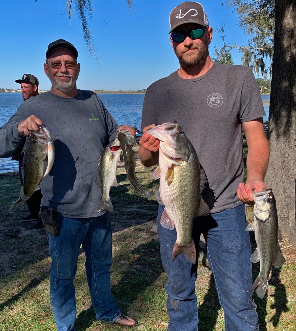 Mark Browning, left, and Daniel Beadle had 17.52 pounds and also had big bass with a 7.96 pounder to win the Mosaic Bass Club tournament Jan. 7 at Lake Alfred. 