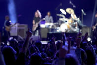 Vaccinated guests react to the Foo Fighters performance at "Vax Live: The Concert to Reunite the World" on Sunday, May 2, 2021, at SoFi Stadium in Inglewood, Calif. (Photo by Jordan Strauss/Invision/AP)