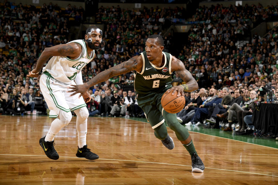 Eric Bledsoe drives past Kyrie Irving on Monday night. (Getty Images)