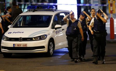 Belgian police take up position following an explosion at Central Station in Brussels, Belgium, June 20, 2017. REUTERS/Francois Lenoir