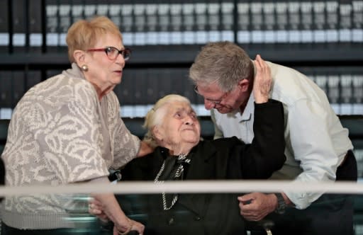 Greek World War II rescuer Melpomeni Dina Gianopoulou is reunited with Holocaust survivors Yossi Mor (R) and his sister Sarah Yanai (L) at the Yad Vashem centre in Jerusalem on November 3, 2019