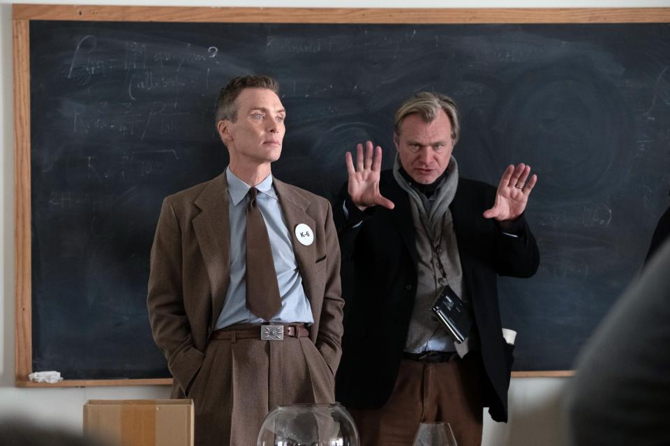 OPPENHEIMER, from left: Cillian Murphy, director Christopher Nolan, on set, 2023. ph: Melinda Sue Gordon / © Universal Pictures / Courtesy Everett Collection
