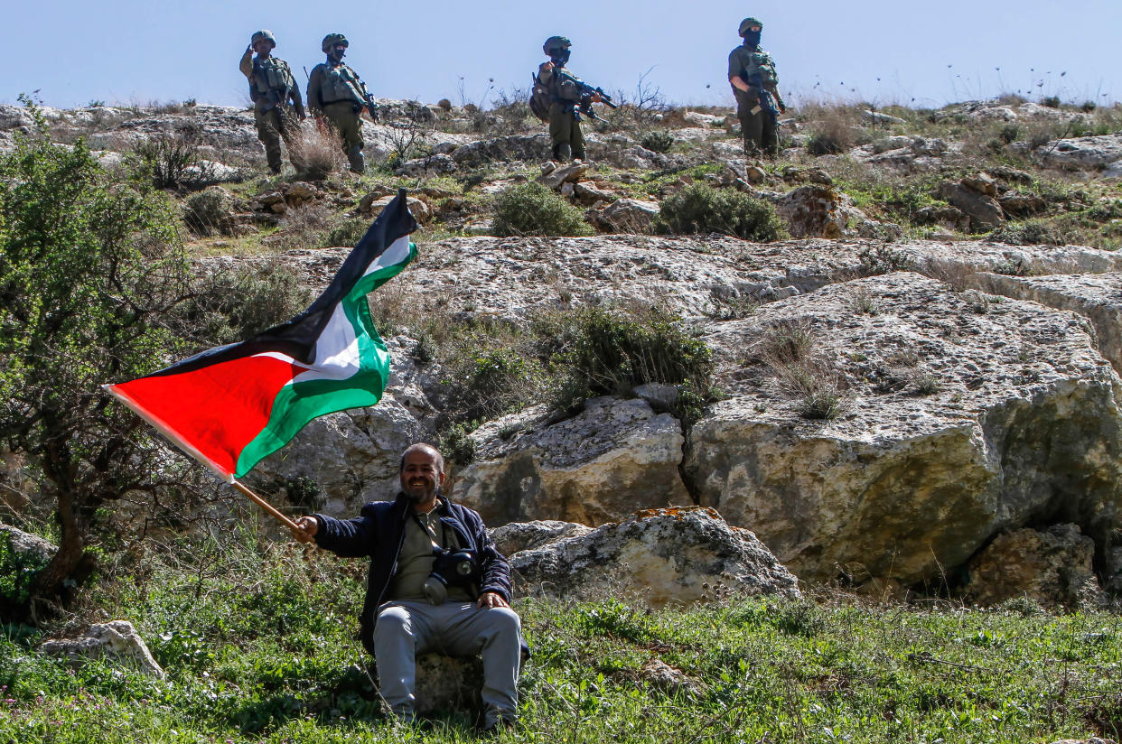 A Palestinian protester against Israeli settlements in the West Bank