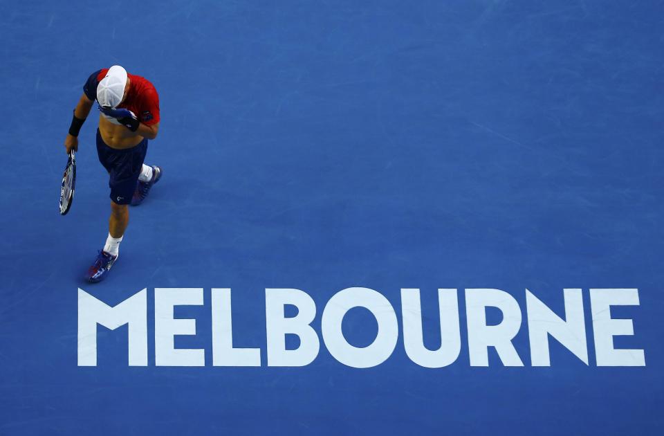 Australia's Lleyton Hewitt reacts during his second round match against Spain's David Ferrer at the Australian Open tennis tournament at Melbourne Park, Australia, January 21, 2016. REUTERS/Jason O'Brien