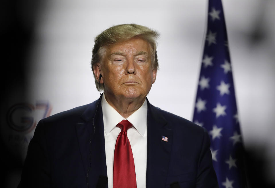 President Donald Trump listens to a question during a press conference on the third and final day of the G-7 summit in Biarritz, France Monday, Aug. 26, 2019. (AP Photo/Markus Schreiber)