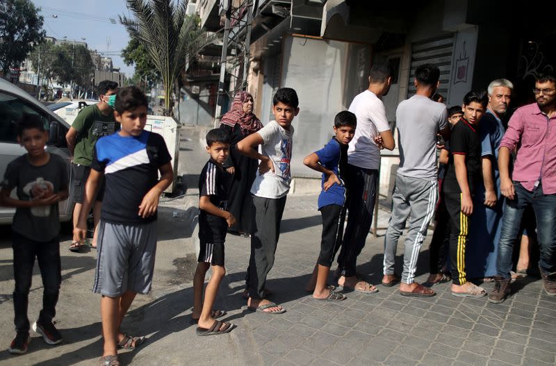 Gaza reports first COVID-19 cases outside quarantine areas, declares lockdown