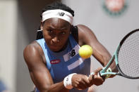 FILE - Coco Gauff plays a shot against Russia's Mirra Andreeva during their third round match of the French Open tennis tournament at the Roland Garros stadium in Paris, Saturday, June 3, 2023. Gauff is expected to compete at Wimbledon next week. (AP Photo/Christophe Ena, File)