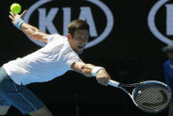 Serbia's Novak Djokovic hits a shot during his Men's singles second round match against Uzbekistan's Denis Istomin. REUTERS/Jason Reed