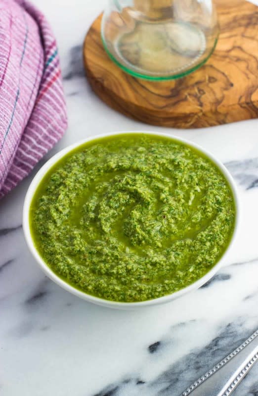 <p>My Sequined Life</p><p>Easy arugula pesto brights up pasta, sandwiches, eggs, and more! This bright and spring-y pesto packs in the leafy greens.</p><p><strong>Get the recipe: <a href="https://www.mysequinedlife.com/arugula-pesto/" rel="nofollow noopener" target="_blank" data-ylk="slk:Arugula Pesto;elm:context_link;itc:0;sec:content-canvas" class="link ">Arugula Pesto</a></strong></p>