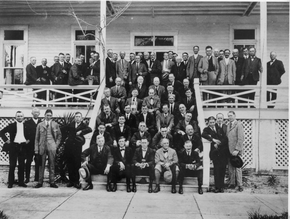 Charter members of the Kiwanis Club included Ralph Caples, sitting at front left on the steps, along with many of the men who made Sarasota a success.