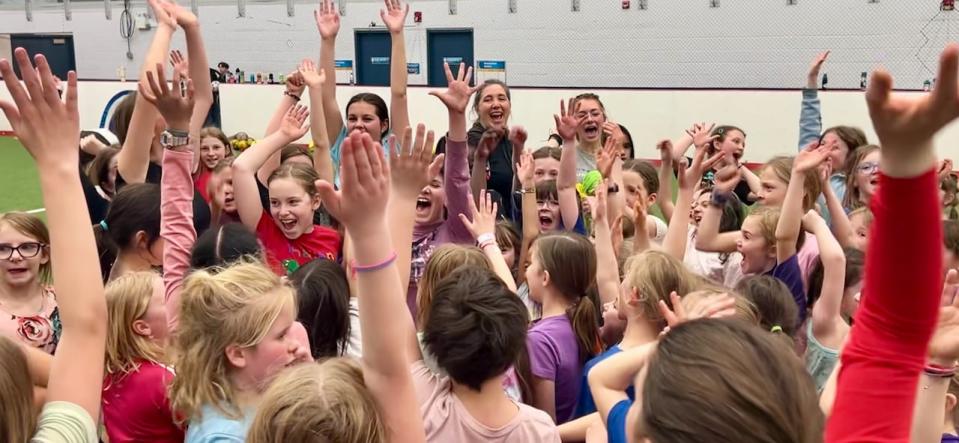 Players cheer at one of  Whitehorse United Football Club's free soccer sessions on April 11, 2024.  (Katie Todd/CBC - image credit)