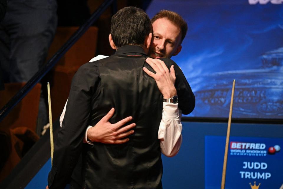 Ronnie O’Sullivan’s long hug with Judd Trump after winning his seventh world title in 2022 went down as an iconic Crucible moment (AFP via Getty Images)