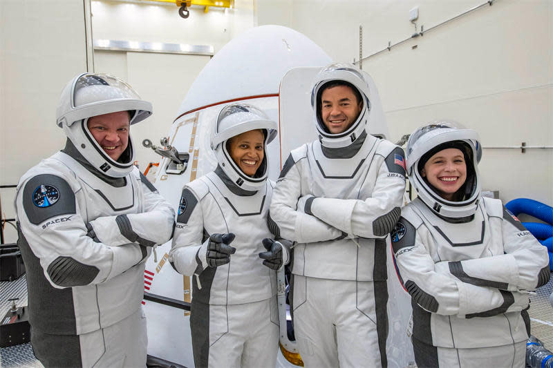 The Inspiration4 crew, checking out their SpaceX pressure suits while visiting the Crew Dragon capsule that will carry them into space on the first all-civilian flight to orbit. Left to right: Chris Sembroski, Sian Proctor, commander Jared Isaacman, Hayley Arceneaux. / Credit: Inspiration4