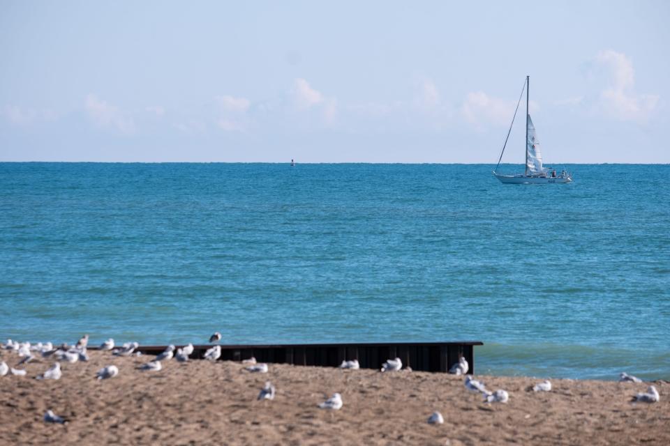 A sailboat floats off of Lighthouse Beach Monday, Aug. 2, 2021, on Lake Huron in Port Huron.