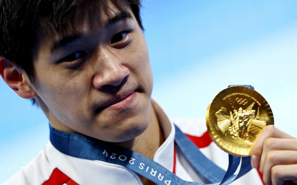 China's Pan Zhanle broke the 100m freestyle world record to win gold at the Paris Games with the largest winning margin in the event since 1928