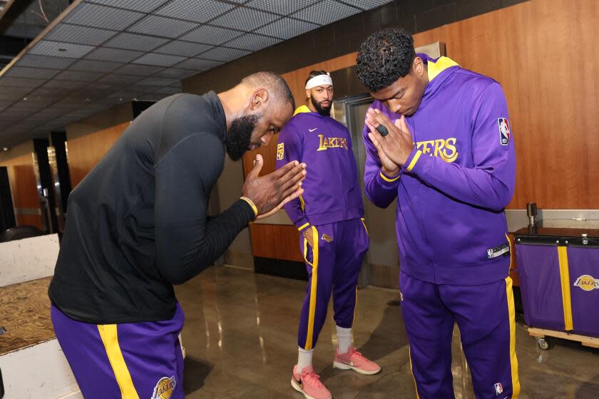 LOS ANGELES, CA - APRIL 11: LeBron James #6 and Rui Hachimura #28 of the Los Angeles Lakers.