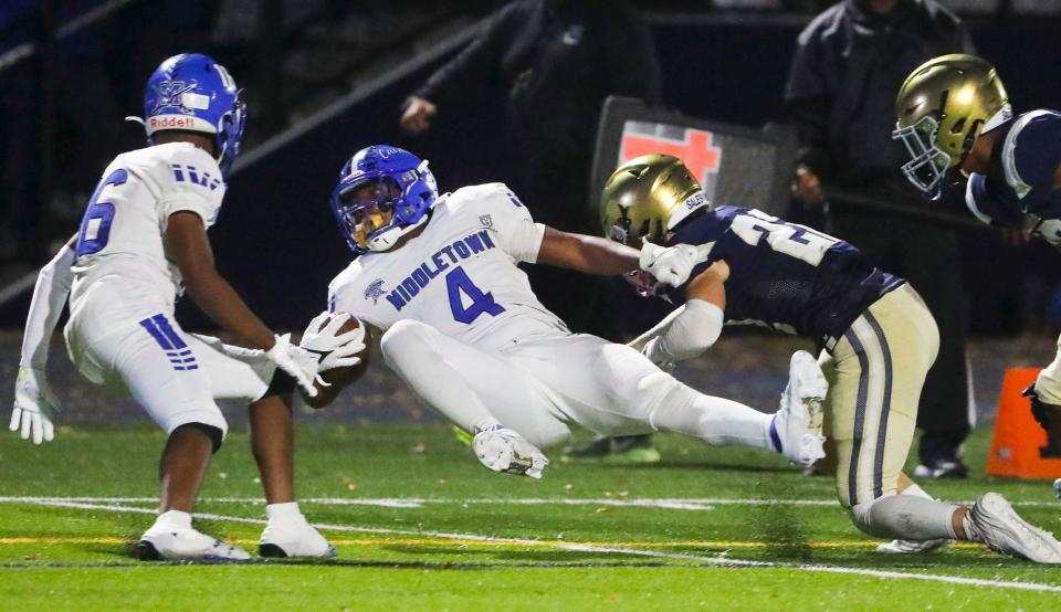 Middletown's Amare Glover is pushed out of bounds after a long gain during Salesianum's 37-14 win on Oct. 27 at Abessinio Stadium.