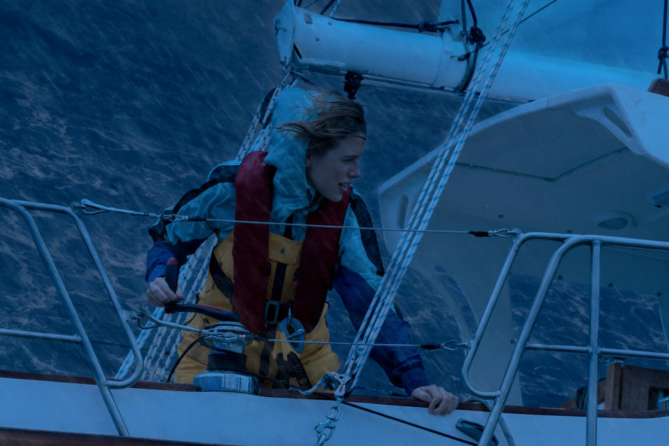 Croft, as Watson, facing threatening seas<span class="copyright">Julian Panetta/Netflix</span>