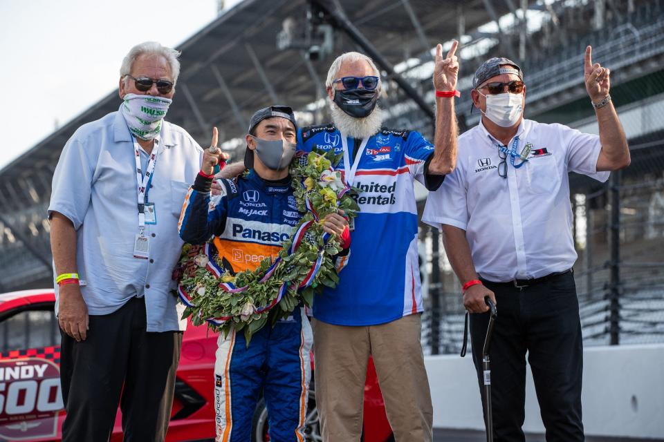 Rahal Letterman Lanigan Racing driver Takuma Sato (30) celebrates with team co-owners Mike Lanigan, David Letterman and Bobby Rahal after winning the 104th Indianapolis 500 at Indianapolis Motor Speedway on Sunday, Aug. 23, 2020. 