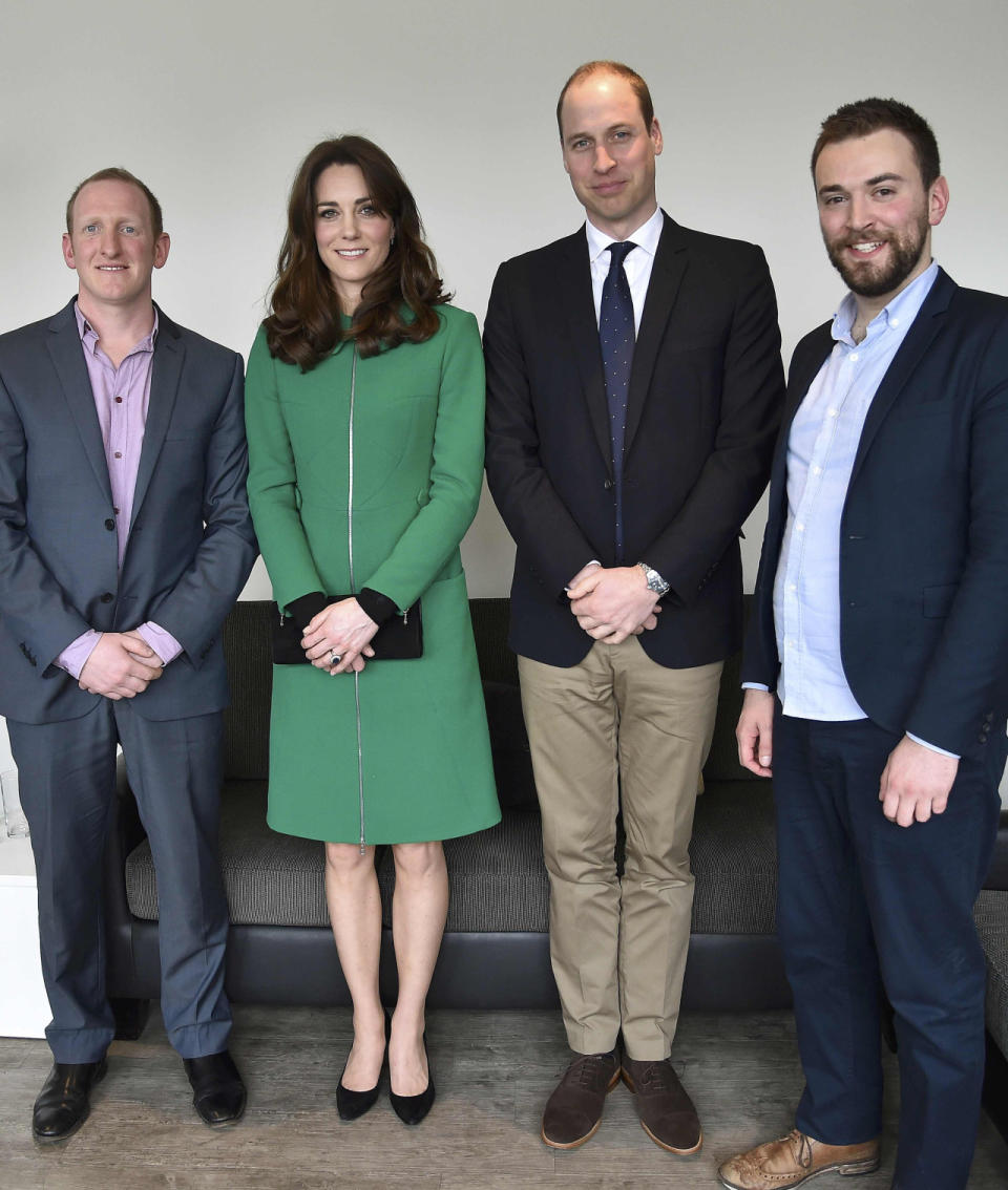 The Duchess of Cambridge in a green Erdem coat during a visit to St. Thomas’ Hospital in London. 