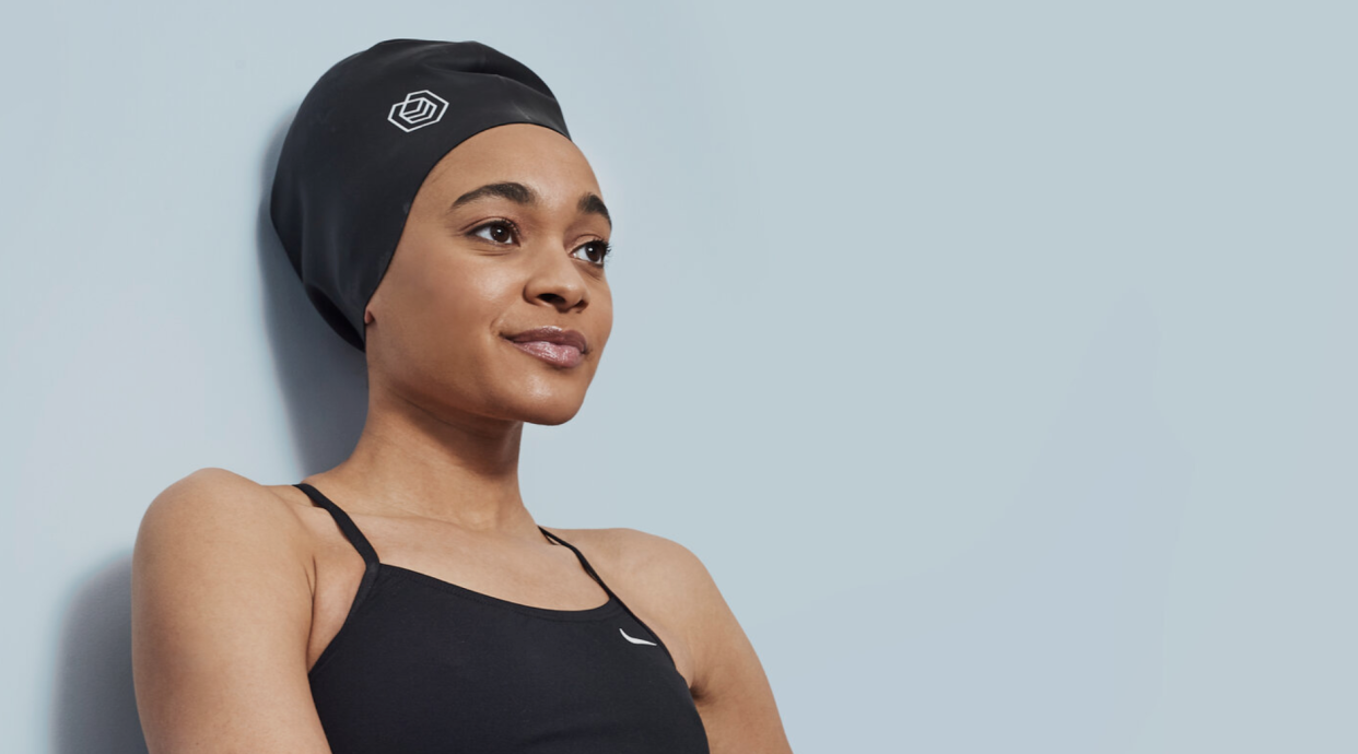 Swimmer Alice Dearing models a Soul Cap swim cap. (Via SoulCap.com)