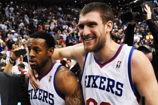 Andre Iguodala (L) and Spencer Hawes of the Philadelphia 76ers walk off the court after a 79-78 win over the Chicago Bulls in Game Six of the Eastern Conference Quarterfinals in the 2012 NBA Playoffs at the Wells Fargo Center, on May 10, in Philadelphia, Pennsylvania. The 76ers ousted the top-seeded Bulls and booked a 2nd round clash with the Boston Celtics