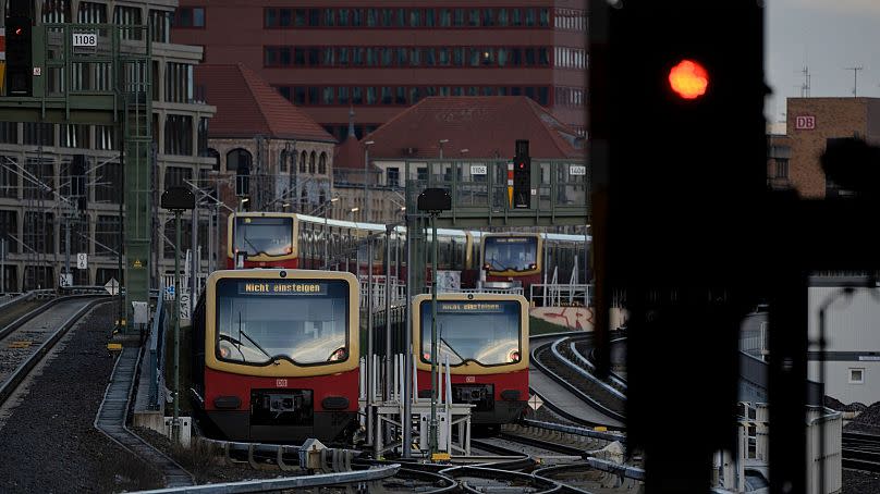 Trains of Berlin's S-Bahn public transport parked on tracks in Berlin, Germany. Trams are included in the monthly pass.