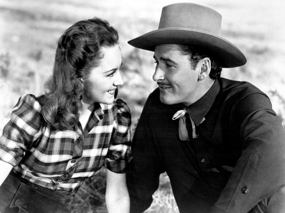 DODGE CITY, Olivia De Havilland, Errol Flynn, 1939