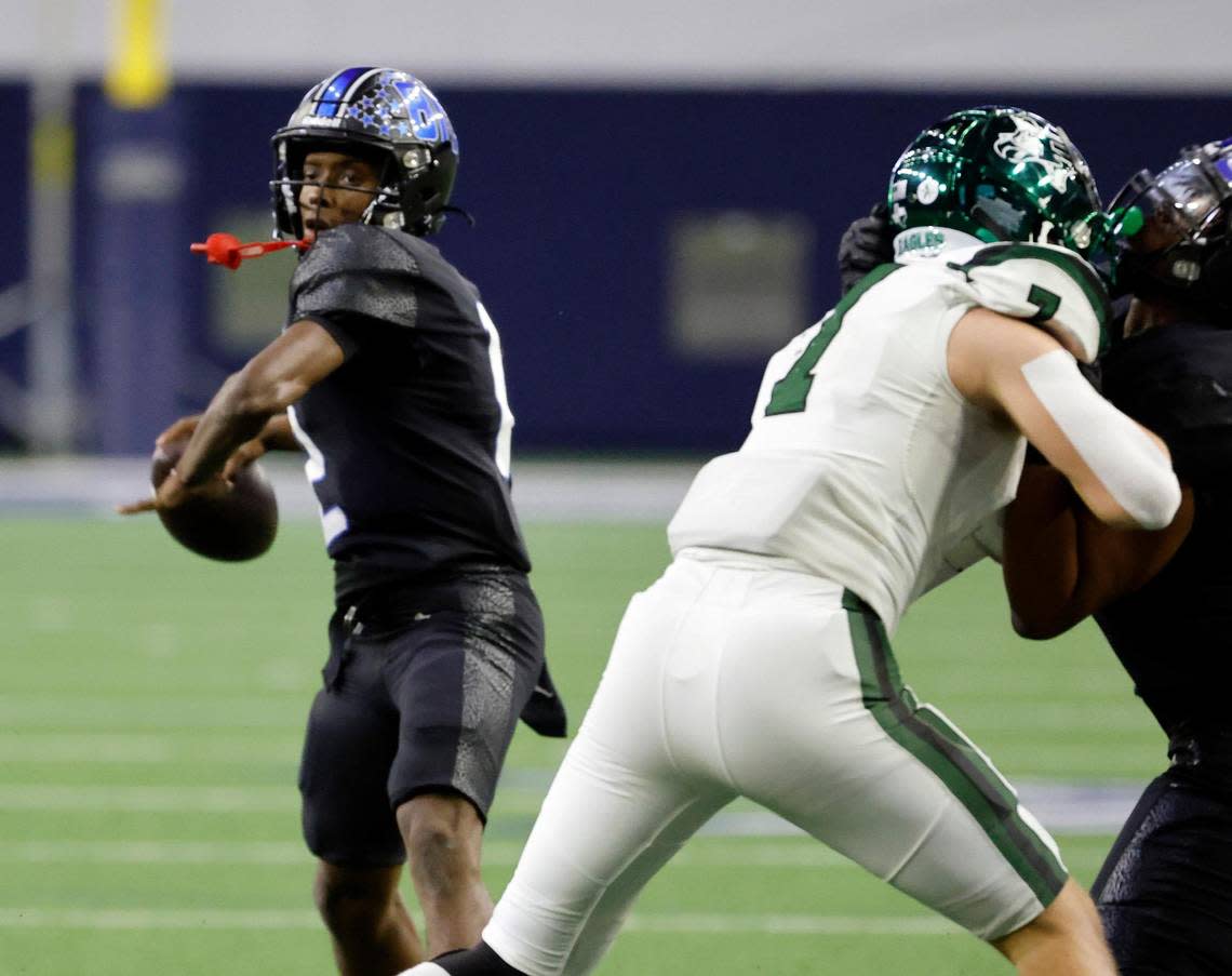 North Crowley quarterback Chris Jimerson (12) tosses a ball downfield in the first half of a UIL Class 6A Division 1 football regional-round playoff game at The Ford Center in Frisco, Texas, Saturday, Oct. 25, 2023.