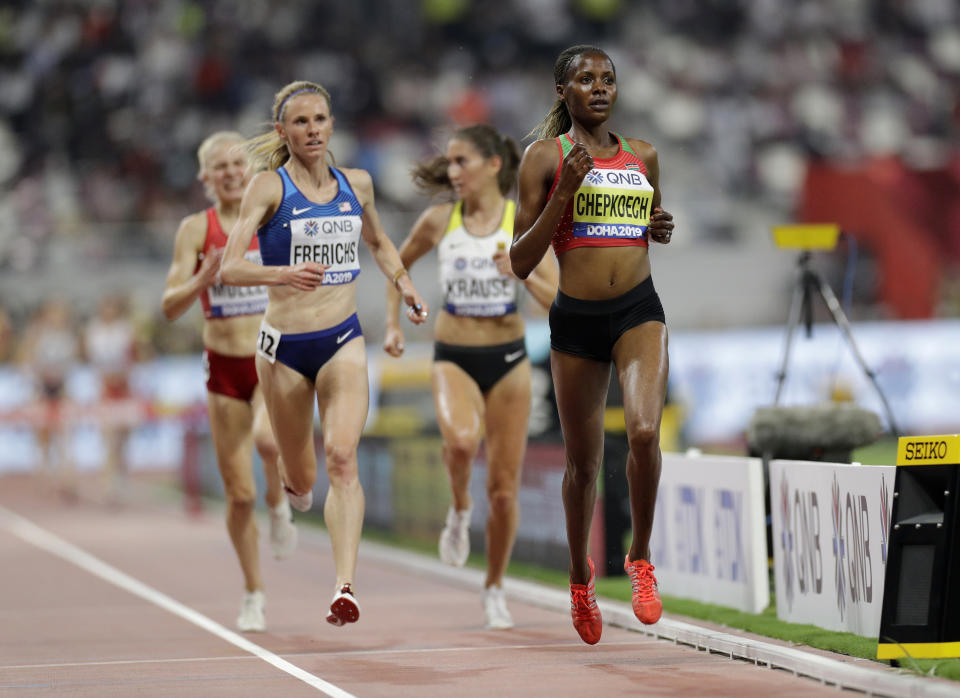 Kenya's Beatrice Chepkoech, right, and Courtney Frerichs of the United States compete during the women's 3,000 meters steeplechase heats at the World Athletics Championships in Doha, Qatar, Friday, Sept. 27, 2019. (AP Photo/Petr David Josek)