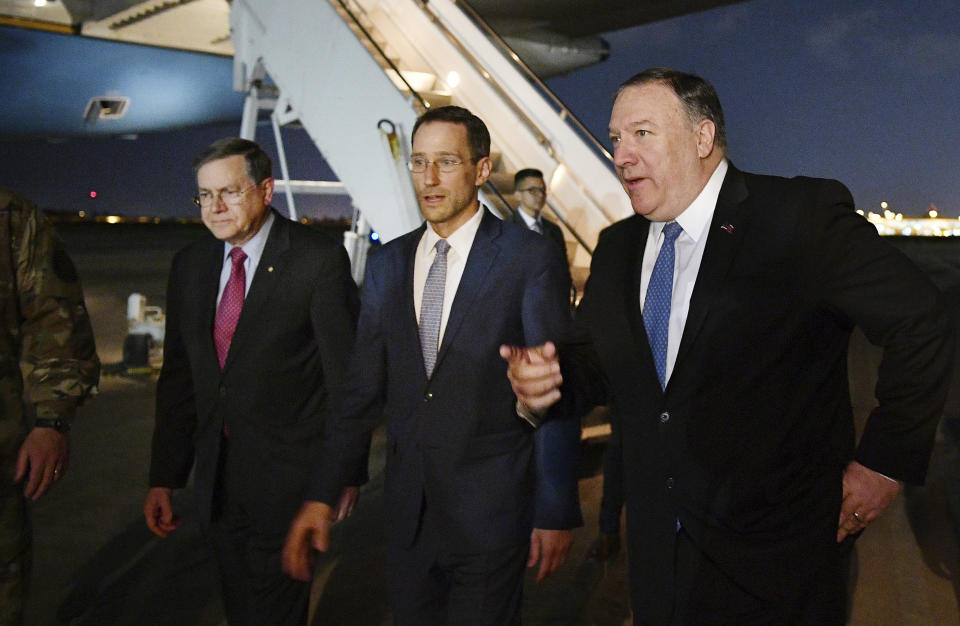 Secretary of State Mike Pompeo, right walks with Acting Assistant Secretary for Near Eastern Affairs at the State Department David Satterfield, left, and Charge D'affaires at the U.S. Embassy in Baghdad Joey Hood upon arrival in Baghdad, on Tuesday, May 7, 2019. (Mandel Ngan/Pool Photo via AP)