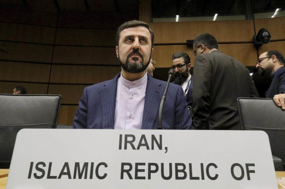 FILE - In this Thursday, Nov. 21, 2019 file photo Iran's Ambassador to the International Atomic Energy Agency, IAEA, Kazem Gharibabadi, waits for the start of the IAEA board of governors meeting at the International Center in Vienna, Austria. The board of the United Nations' atomic watchdog agency on Friday adopted a resolution calling for Iran to provide inspectors access to sites where the country is thought to have stored or used undeclared nuclear material. (AP Photo/Ronald Zak, file)