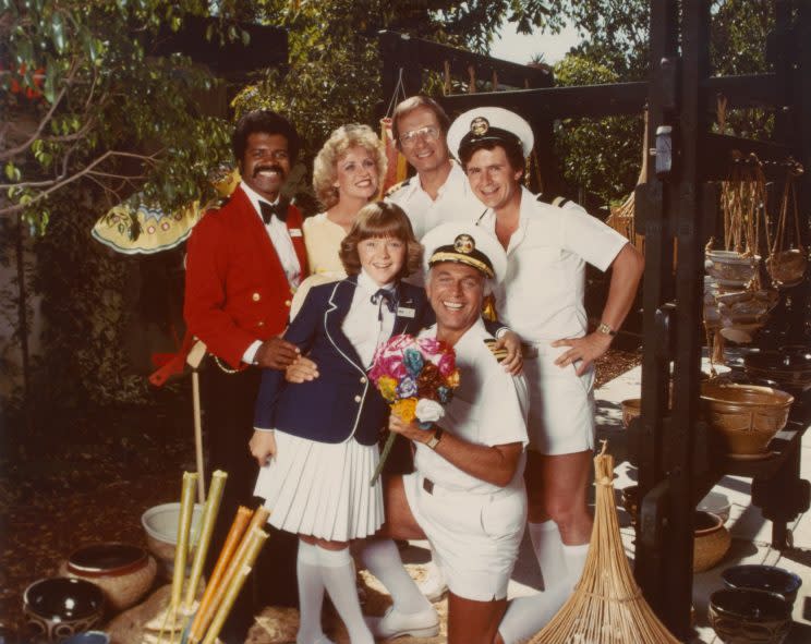 <em>The Love Boat</em> cast (clockwise from top left): Ted Lange, Lauren Tewes, Bernie Kopell, Fred Grandy, Gavin MacLeod, and Jill Whelan, circa 1978. (Photo: Everett Collection)