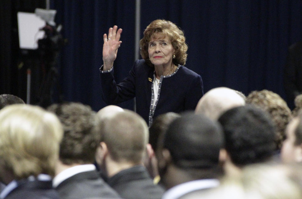 FILE - This Jan. 26, 2012 file photo, shows Sue Paterno, wife of former Penn State football coach Joe Paterno, waves to well-wishers as she enters a memorial service for her husband at Penn State's Bryce Jordan Center in State College, Pa. Joe Paterno earned a state pension of $13.4 million for his 61-year coaching career at Penn State. Paterno's family announced Tuesday, May 22, 2012, through a spokesman that Paterno's widow, Sue, would receive an initial payment of $10.1 million by the end of May, with the rest to be paid out over the next two years. (AP Photo/Gene J. Puskar, File)