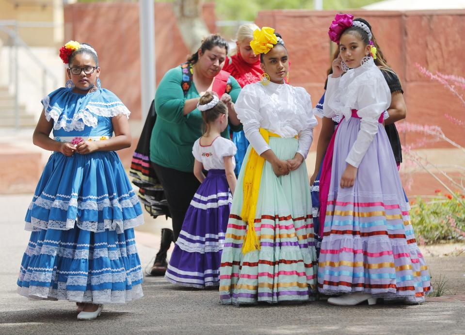 Dancers get ready at the Cinco de Mayo street festival in downtown Phoenix on May 5, 2019.