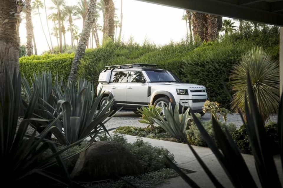 a white car parked in a driveway