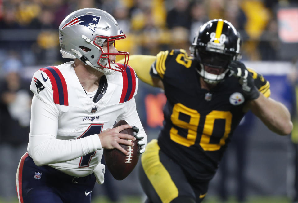 Dec 7, 2023; Pittsburgh, Pennsylvania, USA; New England Patriots quarterback <a class="link " href="https://sports.yahoo.com/nfl/players/34093" data-i13n="sec:content-canvas;subsec:anchor_text;elm:context_link" data-ylk="slk:Bailey Zappe;sec:content-canvas;subsec:anchor_text;elm:context_link;itc:0">Bailey Zappe</a> (4) runs the ball as Pittsburgh Steelers linebacker <a class="link " href="https://sports.yahoo.com/nfl/players/30143" data-i13n="sec:content-canvas;subsec:anchor_text;elm:context_link" data-ylk="slk:T.J. Watt;sec:content-canvas;subsec:anchor_text;elm:context_link;itc:0">T.J. Watt</a> (90) chases during the third quarter at Acrisure Stadium. <a class="link " href="https://sports.yahoo.com/nfl/teams/new-england/" data-i13n="sec:content-canvas;subsec:anchor_text;elm:context_link" data-ylk="slk:New England;sec:content-canvas;subsec:anchor_text;elm:context_link;itc:0">New England</a> won 21-18. Mandatory Credit: Charles LeClaire-USA TODAY Sports