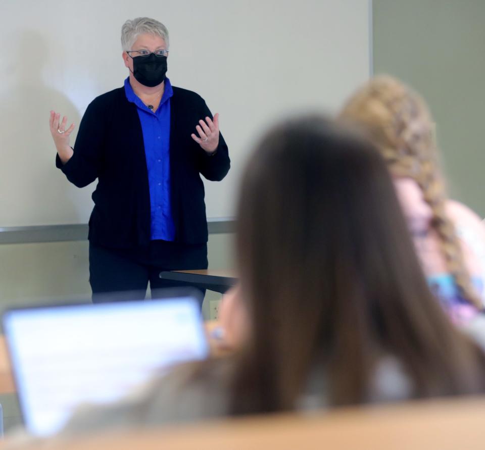University of Akron Associate Professor Stephanie Yuhas teaches her Theory of Criminal Law class Wednesday in Akron.