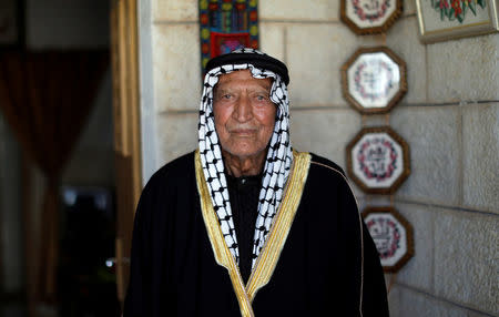 Palestinian man Abdel Fatah Shijaiya, 96, poses for a photo at his house near Ramallah in the occupied West Bank June 21, 2018. Picture taken June 21, 2018. REUTERS/Mohamad Torokman