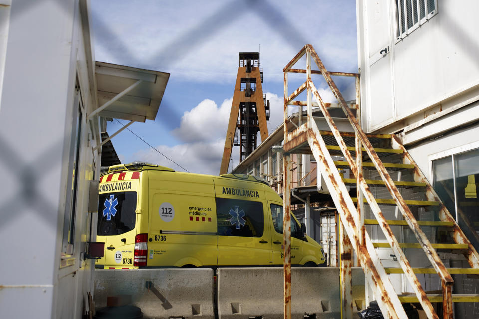 An ambulance is photographed inside the Cabanasses de Súria mine, around 80 kilometers (50 miles) northwest of Barcelona, Spain, Thursday, March 9, 2023. Three workers died after becoming trapped deep underground in a potash mine in northeastern Spain on Thursday, firefighters said. (AP Photo/Joan Mateu Parra)