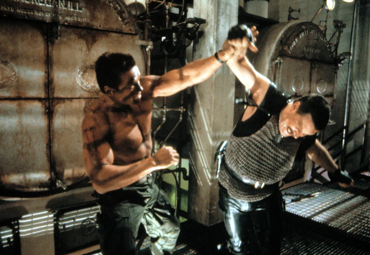 Schwarzenegger and Vernon Wells in 'Commando' (Photo: 20th Century Fox Film Corp./Courtesy Everett Collection)