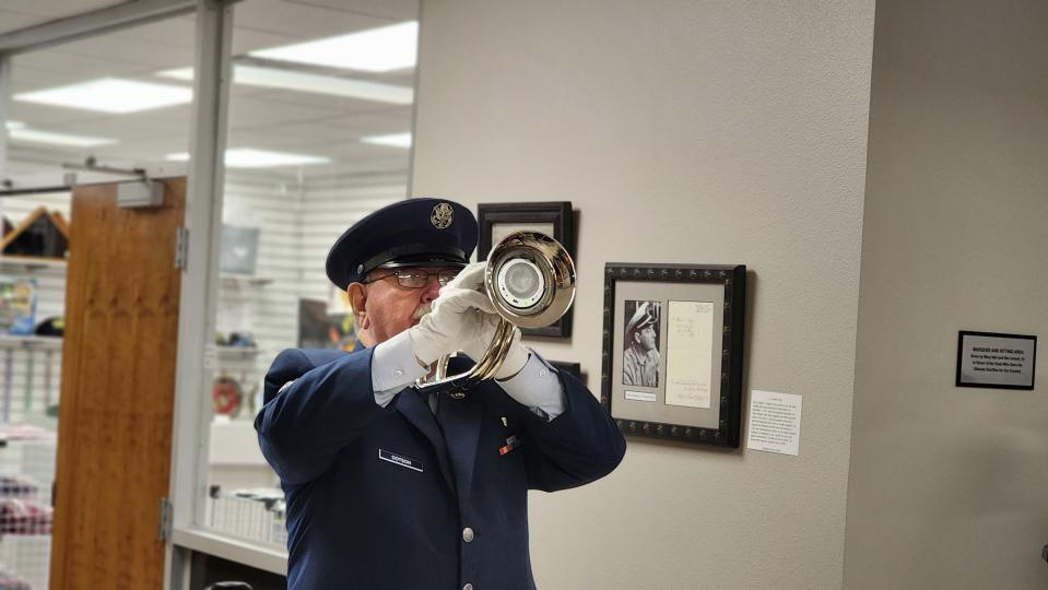 Air Force Veteran Bill Dotson plays "Taps" on his bugle Friday during the Veterans Day Ceremony at the Texas Panhandle War Memorial Center.