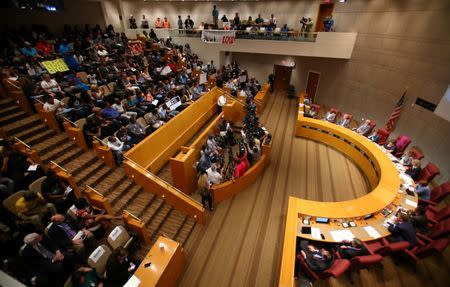 Members of the black community attend a open community forum to speak to the city council in Charlotte, North Carolina, September 26, 2016. REUTERS/Mike Blake