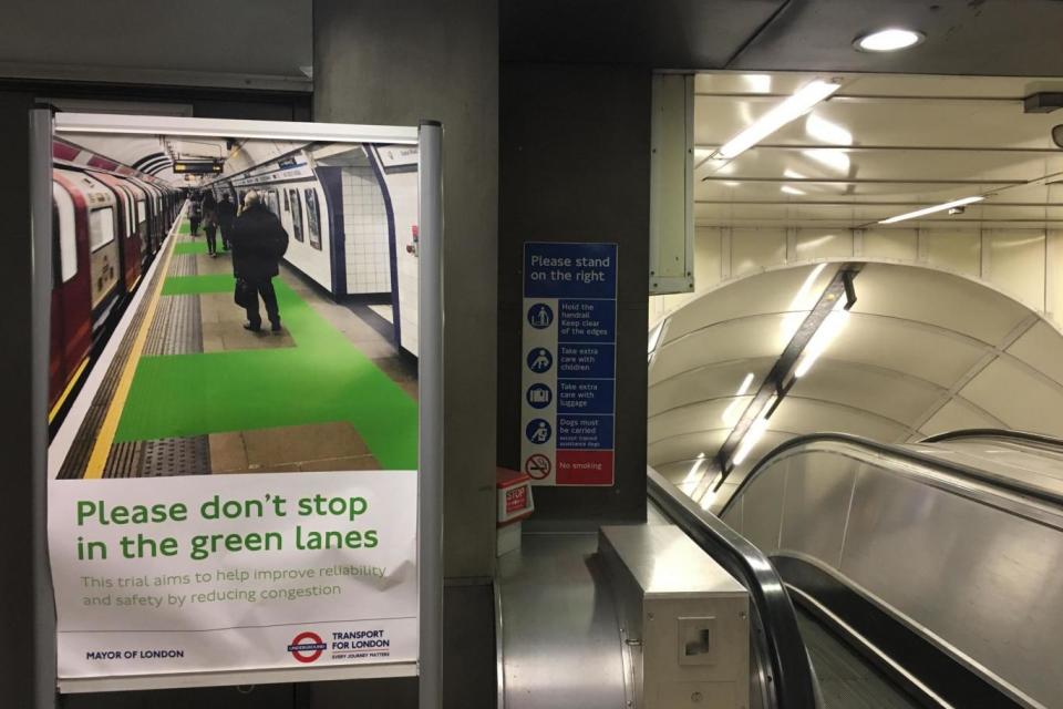 Trial: A sign warning commuters about the new green markings at King's Cross station