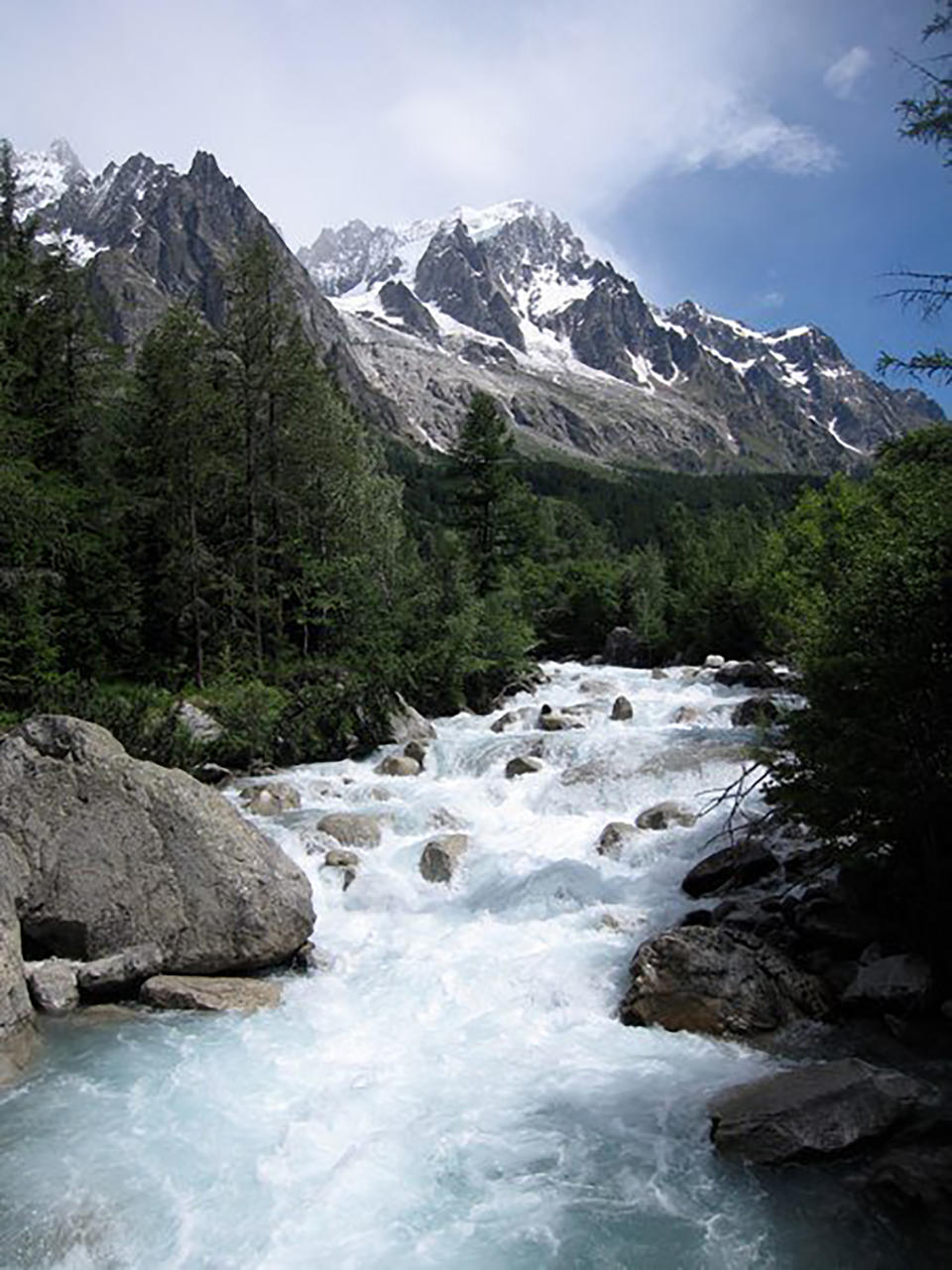 In this photo dated 2009, risk of part of the Planpincieux glacier breaking off amid climate warming in the Alps has prompted Italian authorities to forbid hikers and tourists from a section of the Val Ferrat area, shown in this June 2009 photo from the famed Tour du Mont Blanc trail outside Courmayeur, Italy. The fast-moving Italian glacier is melting quickly, threatening the picturesque valley near the Alpine town of Courmayeur and prompting Mayor Stefano Miserocchi to close down a mountain road. (AP Photo / Randall Hackley)