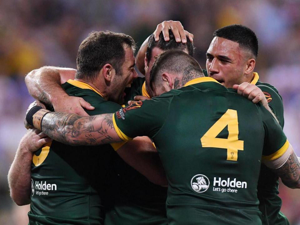 Australia celebrate after Boyd Cordner scores the only try of the World Cup final (Getty)